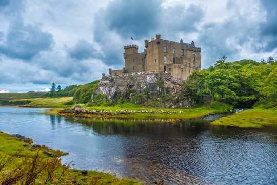 Dunvegan Castle on the Isle of Skye, Highlands of of Scotland. Seat of the MacLeod Clan. Built on an elevated rock overlooking Loch Dunvegan.