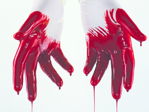 White gloved bloody hands dripping