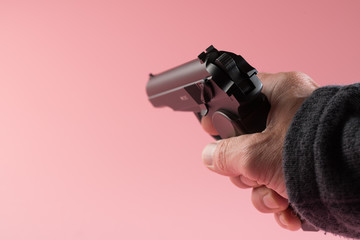 Fototapeta premium Male hand with gun
