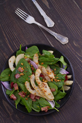 Spinach pear and bacon salad with walnuts