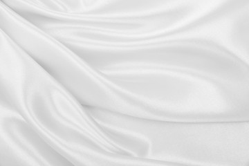 Naklejka na ściany i meble Smooth elegant white silk or satin luxury cloth texture as wedding background. Luxurious Christmas background or New Year background design