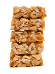 peanut in a sugar syrup (caramel) on a white background