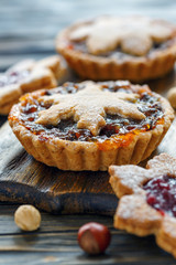 Tartlets with dried fruits, orange jam and nuts.
