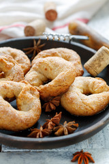 Traditional Italian wine donuts on a wooden platter.