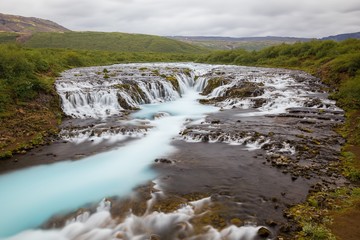 Bruarfoss waterfall in Summer, Iceland. Nordic nature scenery