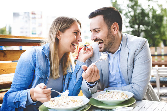 Couple enjoying pasta