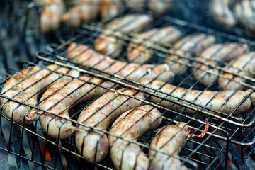 Sausages on barbecue grill