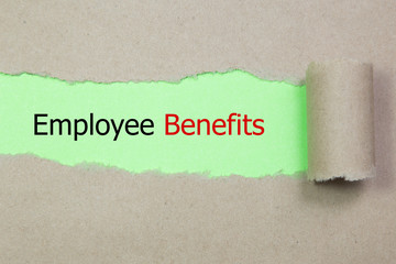 The text Employee Benefits appearing behind torn paper