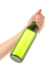 Glass bottle of soda water in a hand
