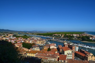 Fototapeta na wymiar Castiglione della Pescaia, Tuscany, Italy 18 August 2014, 5.00 pm. Panoramic view from the top of the castle hill to the bottom.