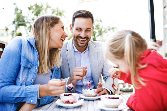 Family Enjoying Restaurant