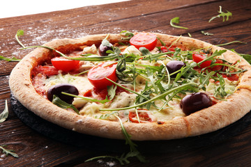 pizza with cheese fresh baked pizza coming out of the oven