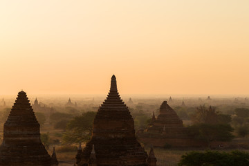 Scenic view of Bagan Plain with many pagodas and temples in Bagan, Myanmar (Burma) at sunrise. Copy space.