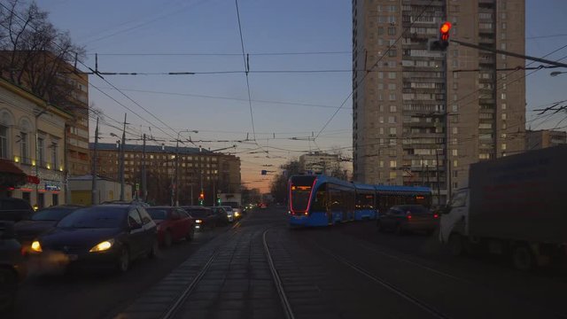 ride on the modern tram through urban streets