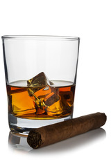 a glass with whiskey and a cigar