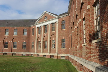 Fototapeta premium Old abandoned brick hospital building