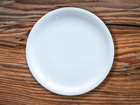 Empty White Plate On Table