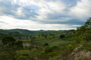 Valley in El Peten, mountains deforested in Guatemala.