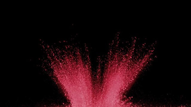 Red powder exploding on black background in super slow motion, shot with Phantom Flex 4K