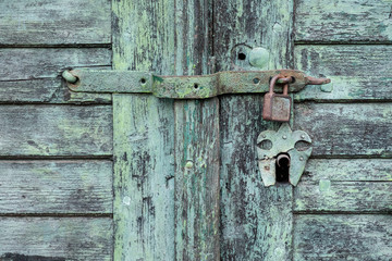 vintage green wooden door lock