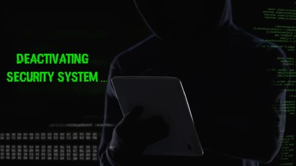 Anonymous hacker remotely deactivating security system, power supplied stopped