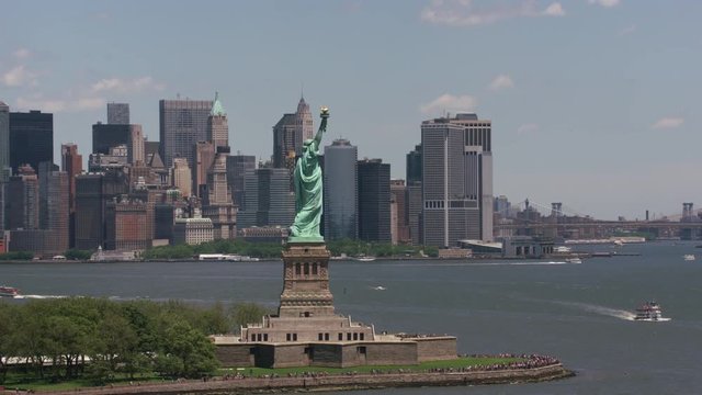 New York City, New York circa-2017, Aerial view of Statue of Liberty and Manhattan.  Shot with Cineflex and RED Epic-W Helium. 