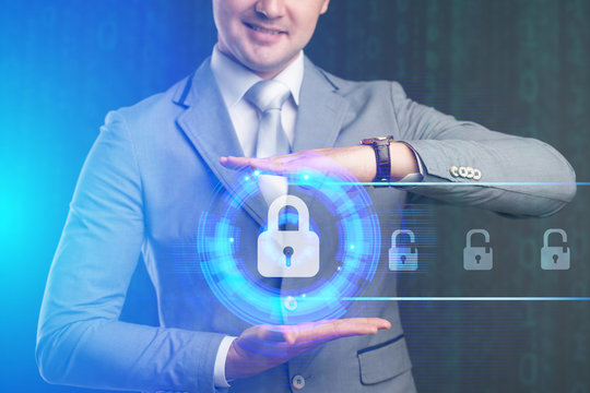 Security services, cybersecurity and protection concept.Businessman offer padlock symbol of security.Business, technology