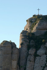 Fototapeta premium Blessed Valley of the Saint Miguel Cross, Abbey of Montserrat, Barcelona, Spain. Santa Maria de Montserrat is a Benedictine abbey located on the mountain of Montserrat, Catalonia, Spain. 