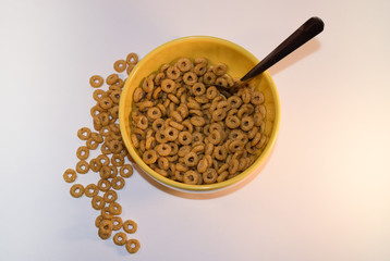 Morning cereal in a yellow bowl