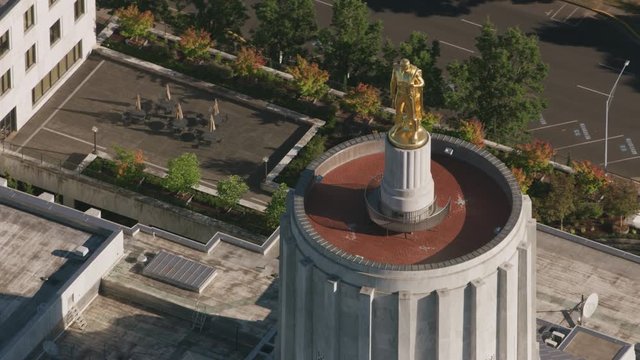 Salem, Oregon circa-2017, Aerial view of golden pioneer on top of Oregon State Capitol Building, Salem, Oregon.  Shot with Cineflex and RED Epic-W Helium. 