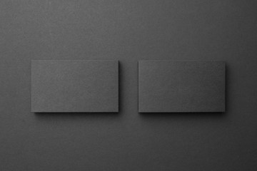 Business card on black background - 187826127