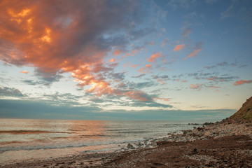 Colourful sunset at the beach with pebbles in Myponga Beach South Australia