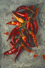 A bunch of dried hot peppers, top view