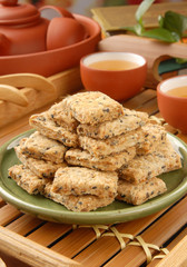 Square cookies on the green plate