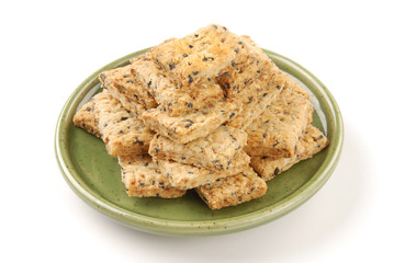 Square cookies on the green plate