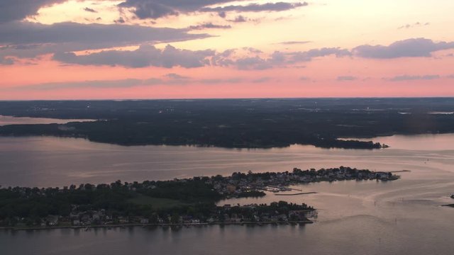 Baltimore, Maryland circa-2017, Aerial view of Chesapeake Bay at sunset.  Shot with Cineflex and RED Epic-W Helium. 