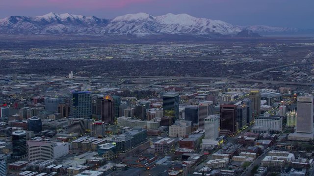 Aerial shot of Salt Lake City and Wasatch Mountains at sunrise