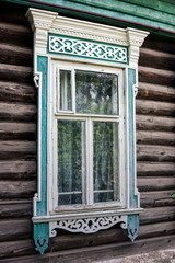 window with an ornament. russian house wooden

