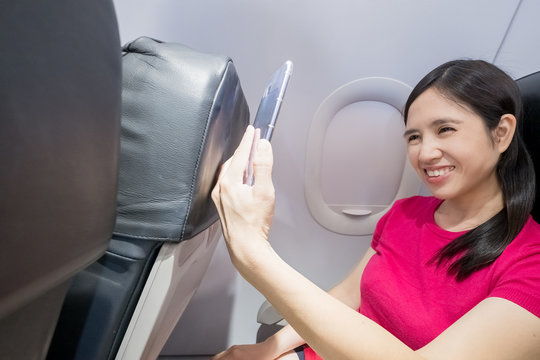 woman selfie in the airplane