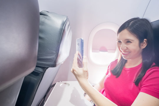 woman selfie in the airplane