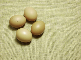 eggs on Hessian sackcloth woven texture background