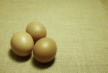 eggs on Hessian sackcloth woven texture background