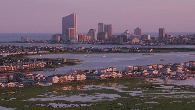 Atlantic City, New Jersey circa-2017, Aerial view of homes with Atlantic City in distance.  Shot with Cineflex and RED Epic-W Helium. 