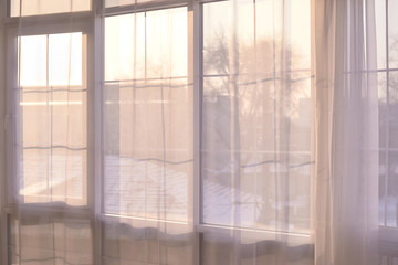 Obraz na płótnie Canvas Big window. Bright interior. Transparent curtains