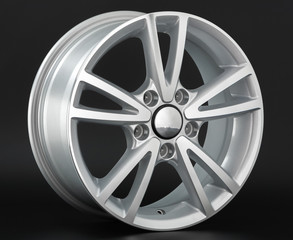 Aluminum metal wheel rim texture. Car alloy wheel, isolated on black background