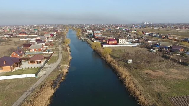View from the top of the village. Streets without asphalt and single-storey houses. The Kuban village