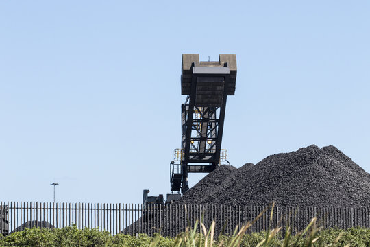 Coal dumps with machinery