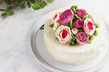 Birthday cake with flowers rose on white background