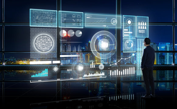 Smart financial analytics working at modern office with big data ,connections icon, internet of things, financial charts and graph virtual screen.