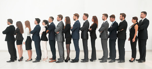 Obraz premium large business team standing one behind the other.